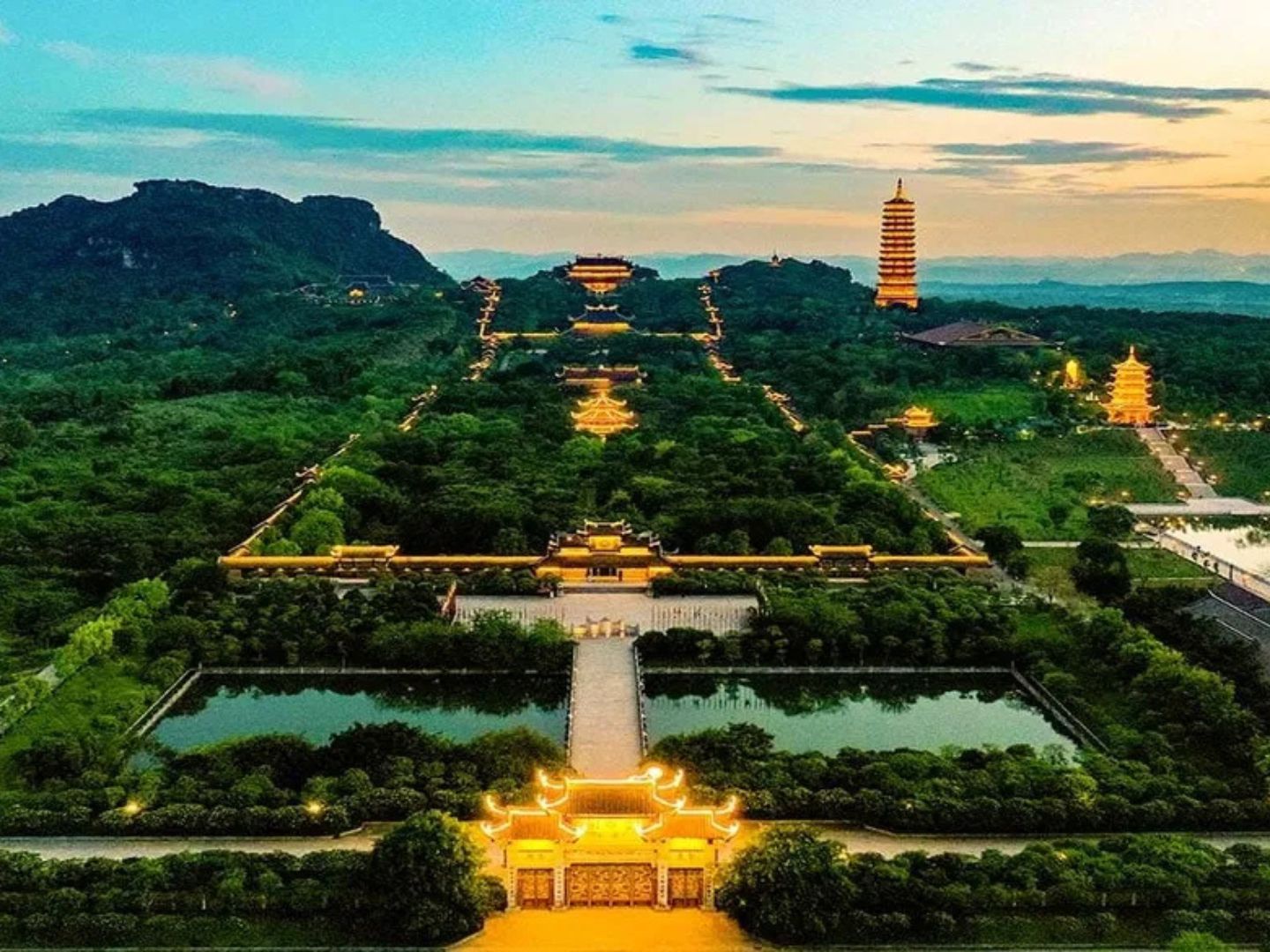 Serene sunrise at Bai Dinh Pagoda entrance
